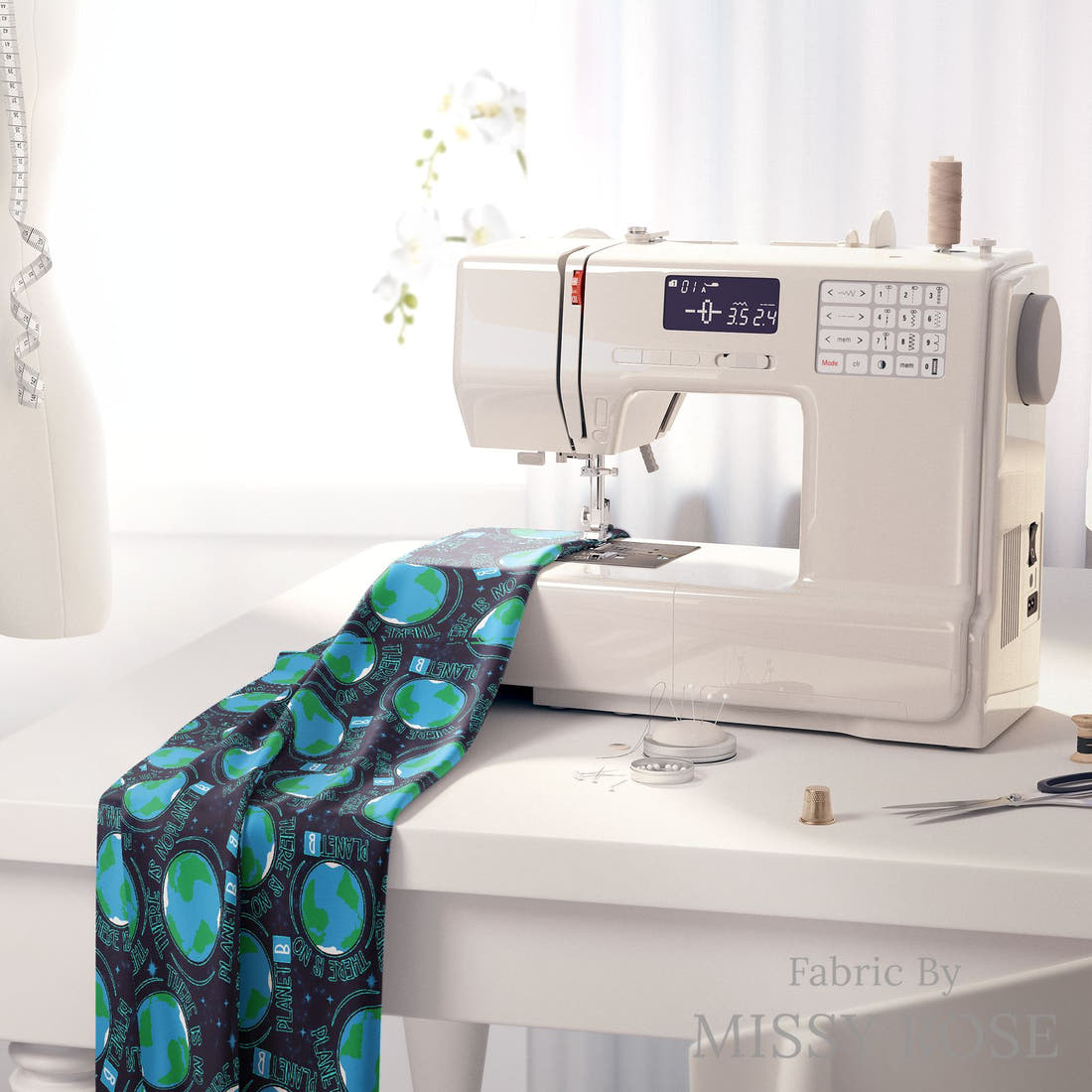 Design 516 Planet B Fabric on a sewing machine – premium fabric for sewing projects | Fabric by Missy Rose