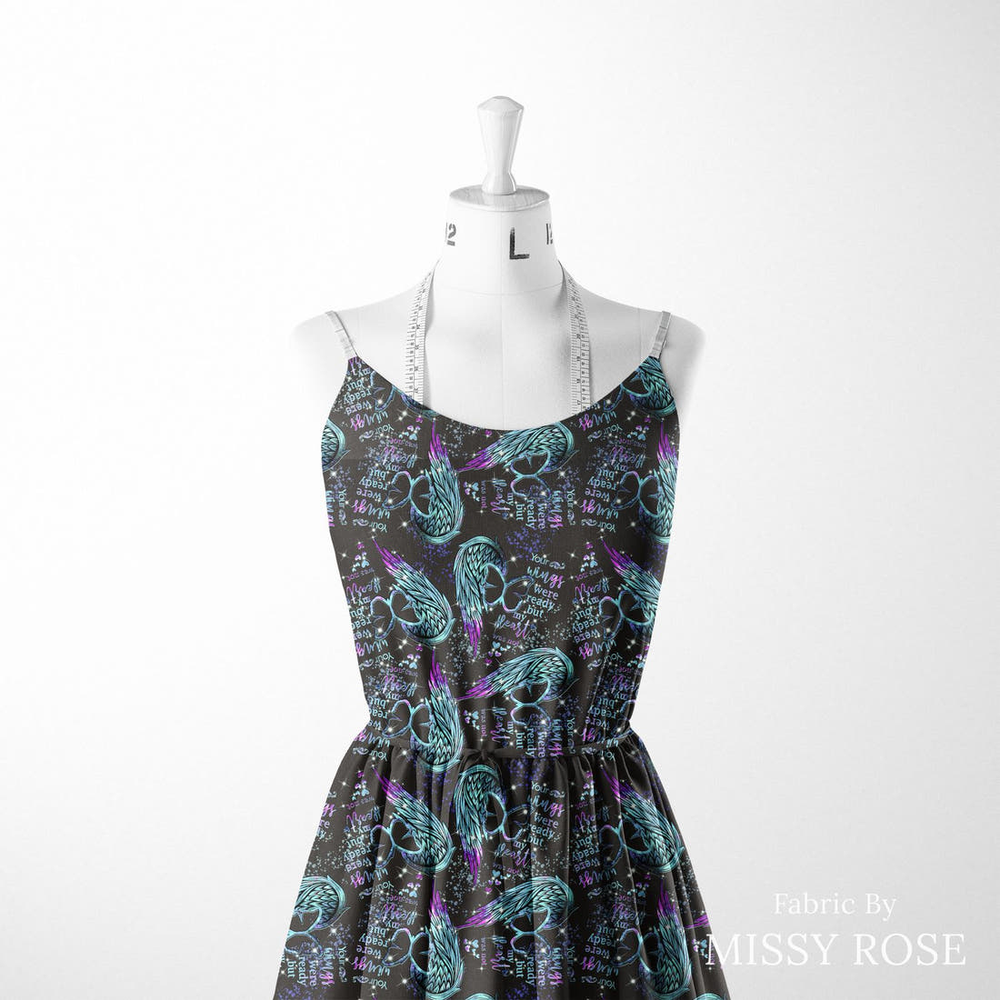 Design 544 Wings Fabric sewn into a women's dress – see how the print looks made up | Fabric by Missy Rose
