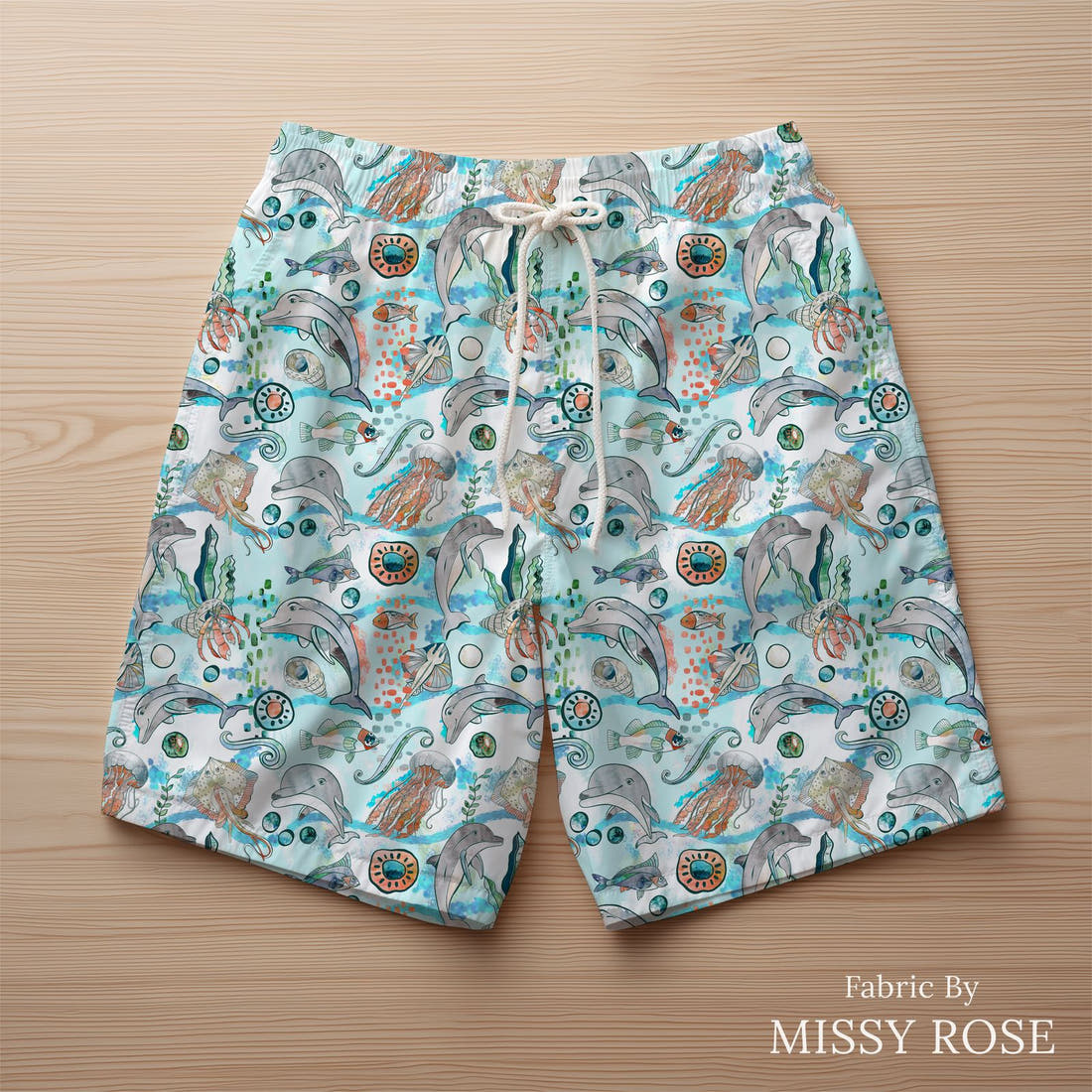 Design 547 Dolphin Fabric sewn into swim shorts – see how the print looks made up | Fabric by Missy Rose
