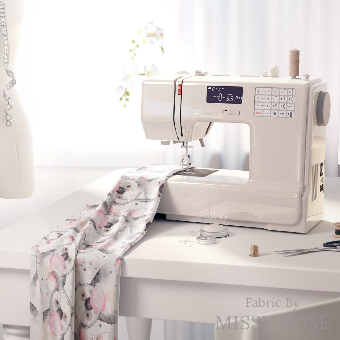 Design 565 Grey Koala Fabric on a sewing machine – premium fabric for sewing projects | Fabric by Missy Rose