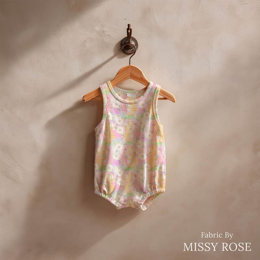 Design 572 Pastel Bear Fabric sewn into a baby romper – see how the print looks made up | Fabric by Missy Rose