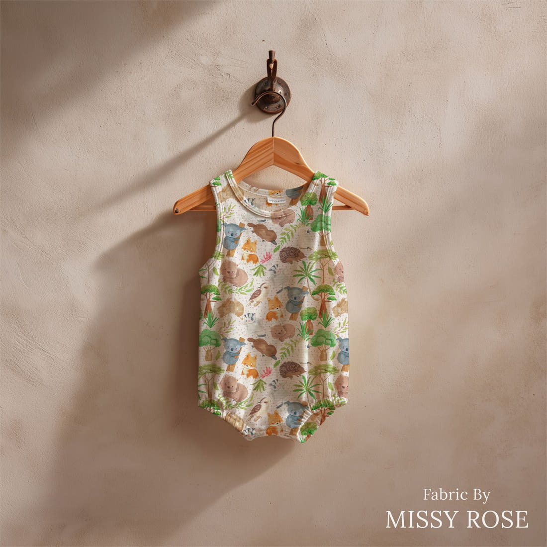 Design 579 Cute Australian Animals Fabric sewn into a baby romper – see how the print looks made up | Fabric by Missy Rose