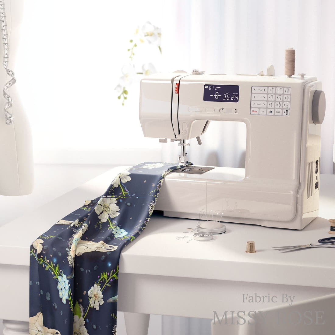 Design 580 Navy Floral Bull Skull Fabric on a sewing machine – premium fabric for sewing projects | Fabric by Missy Rose