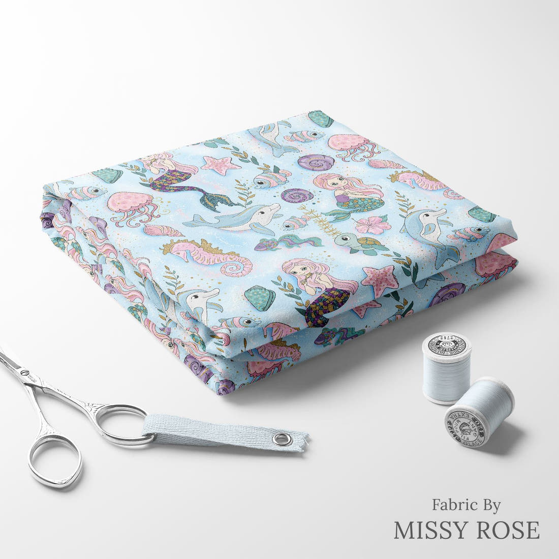 Design 588 Mermaid Dolphin Fabric folded fabric stack with matching thread – pre-order fabric Australia | Fabric by Missy Rose
