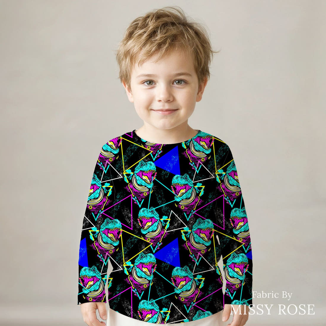 Design 593 Geometric Dinosaur Fabric sewn into a kids' long sleeve top – see how the print looks made up | Fabric by Missy Rose