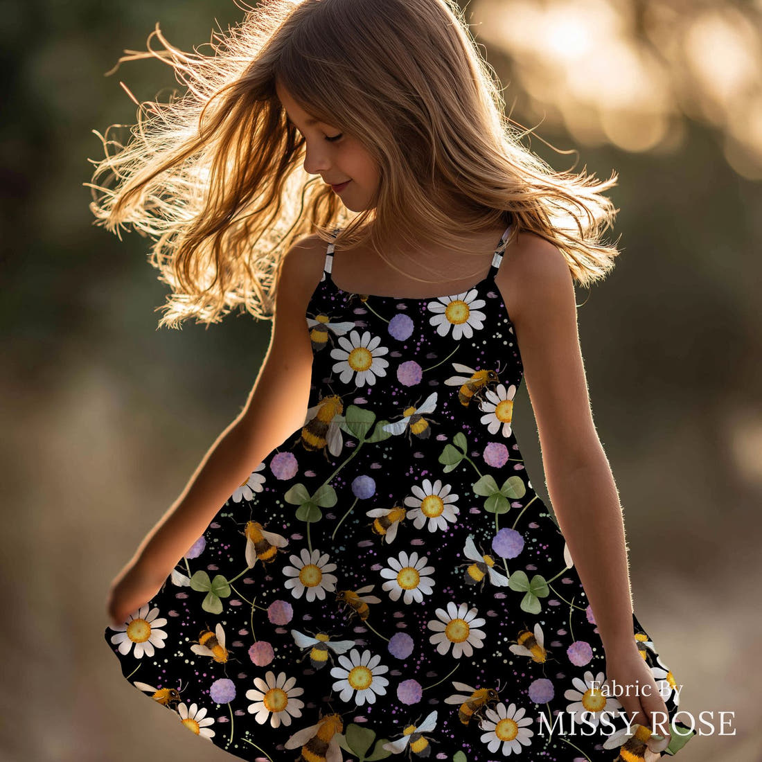 Design 610 Black Bee Fabric sewn into a girls' dress – see how the print looks made up | Fabric by Missy Rose