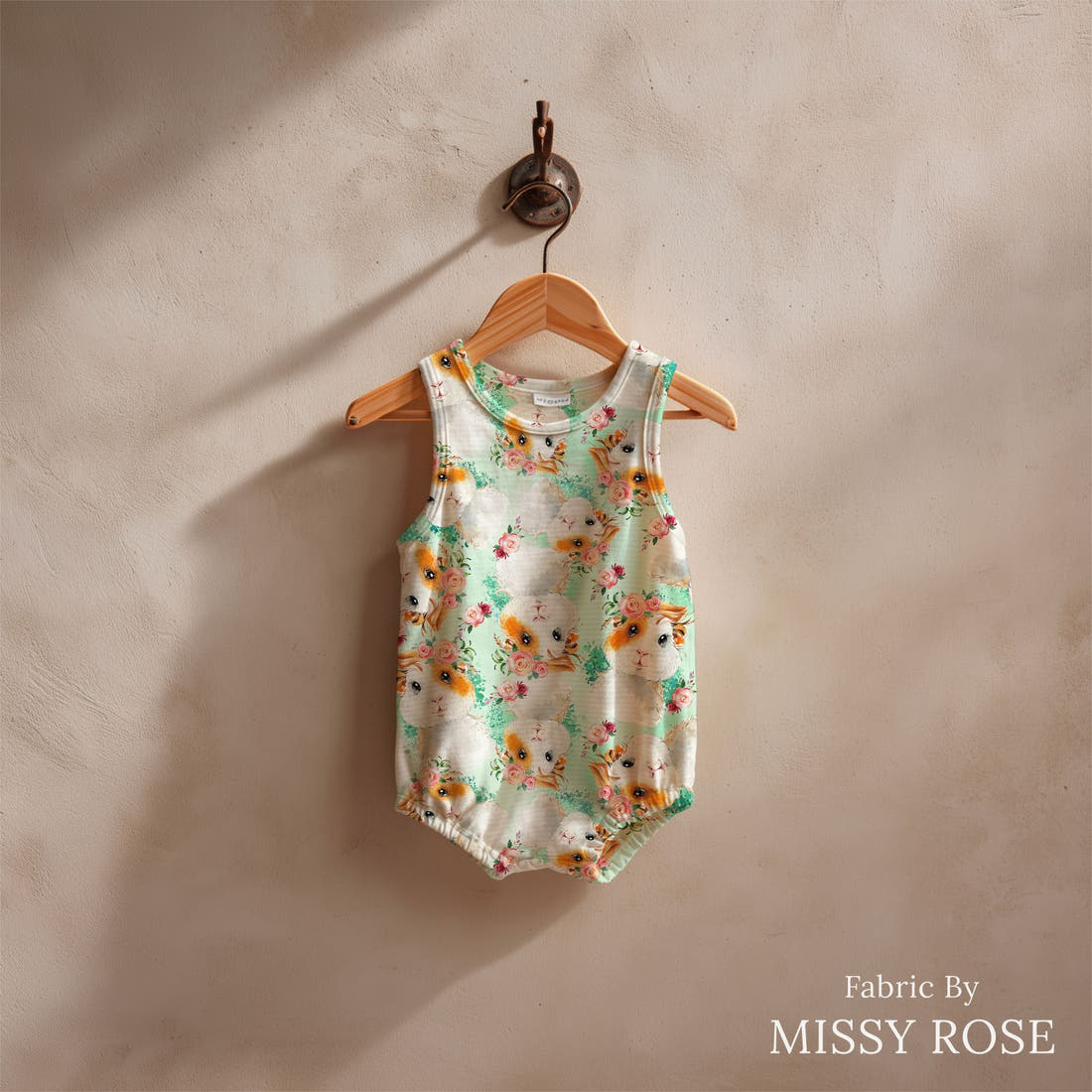 Design 62 Guinea Pig Fabric sewn into a baby romper – see how the print looks made up | Fabric by Missy Rose