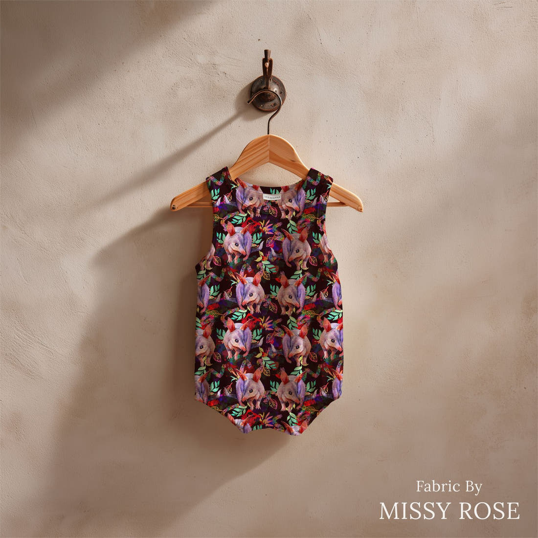 Design 626 Bandicoot Fabric sewn into a baby romper – see how the print looks made up | Fabric by Missy Rose