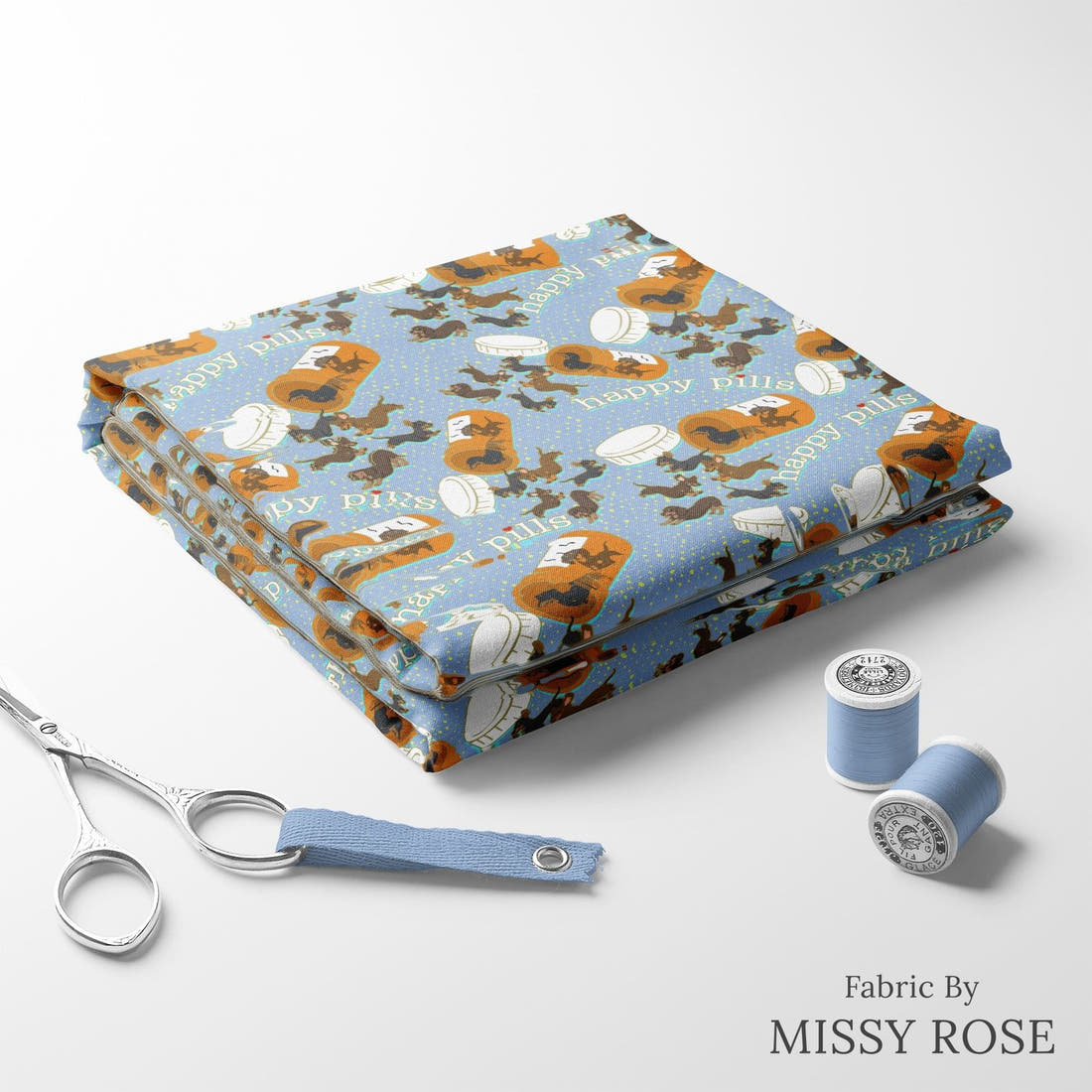Design 63 Sausage Dog Fabric folded fabric stack with matching thread – pre-order fabric Australia | Fabric by Missy Rose