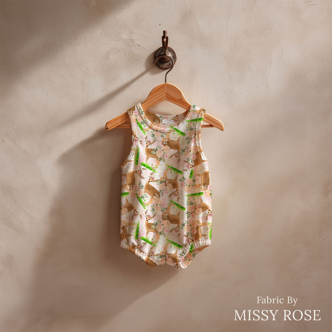 Design 641 Pretty Deer Fabric sewn into a baby romper – see how the print looks made up | Fabric by Missy Rose