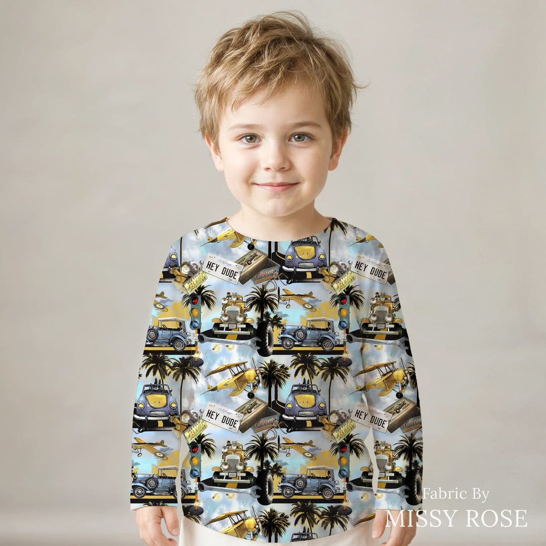 Design 644 Tropical Transport Fabric sewn into a kids' long sleeve top – see how the print looks made up | Fabric by Missy Rose