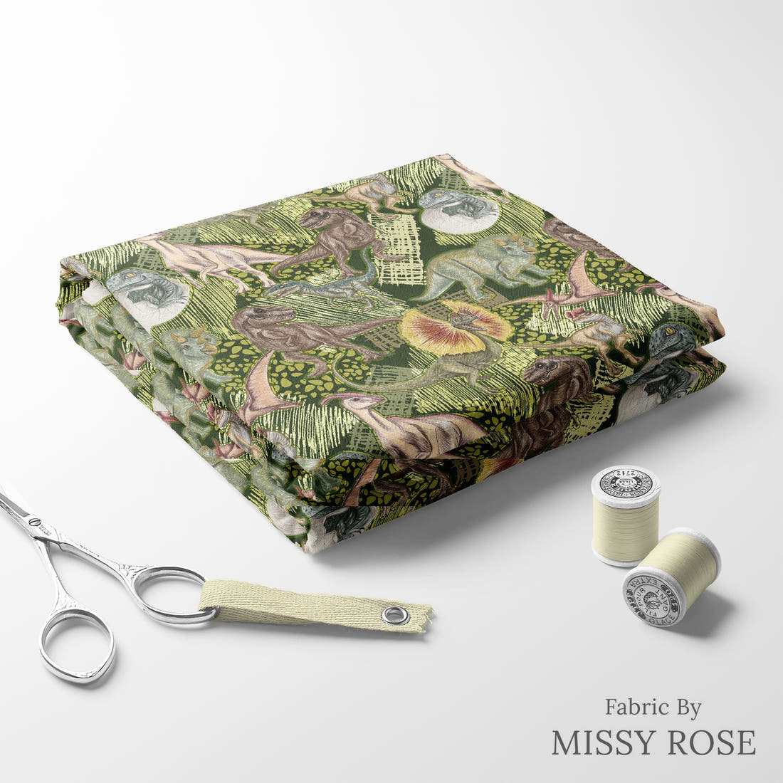Design 649 Green Dino Fabric folded fabric stack with matching thread – pre-order fabric Australia | Fabric by Missy Rose