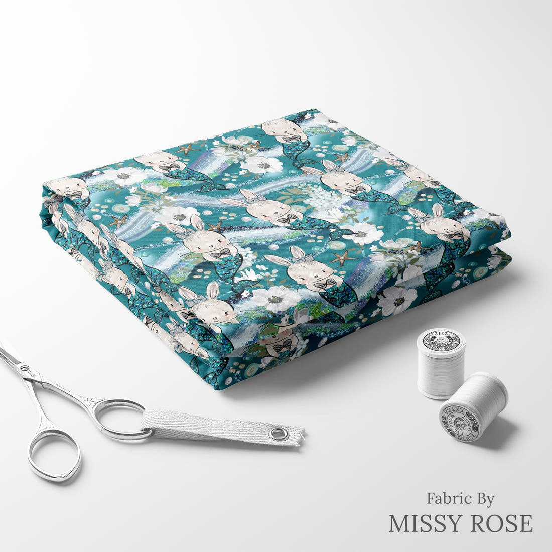 Design 677 Mermaid Bunny Fabric folded fabric stack with matching thread – pre-order fabric Australia | Fabric by Missy Rose