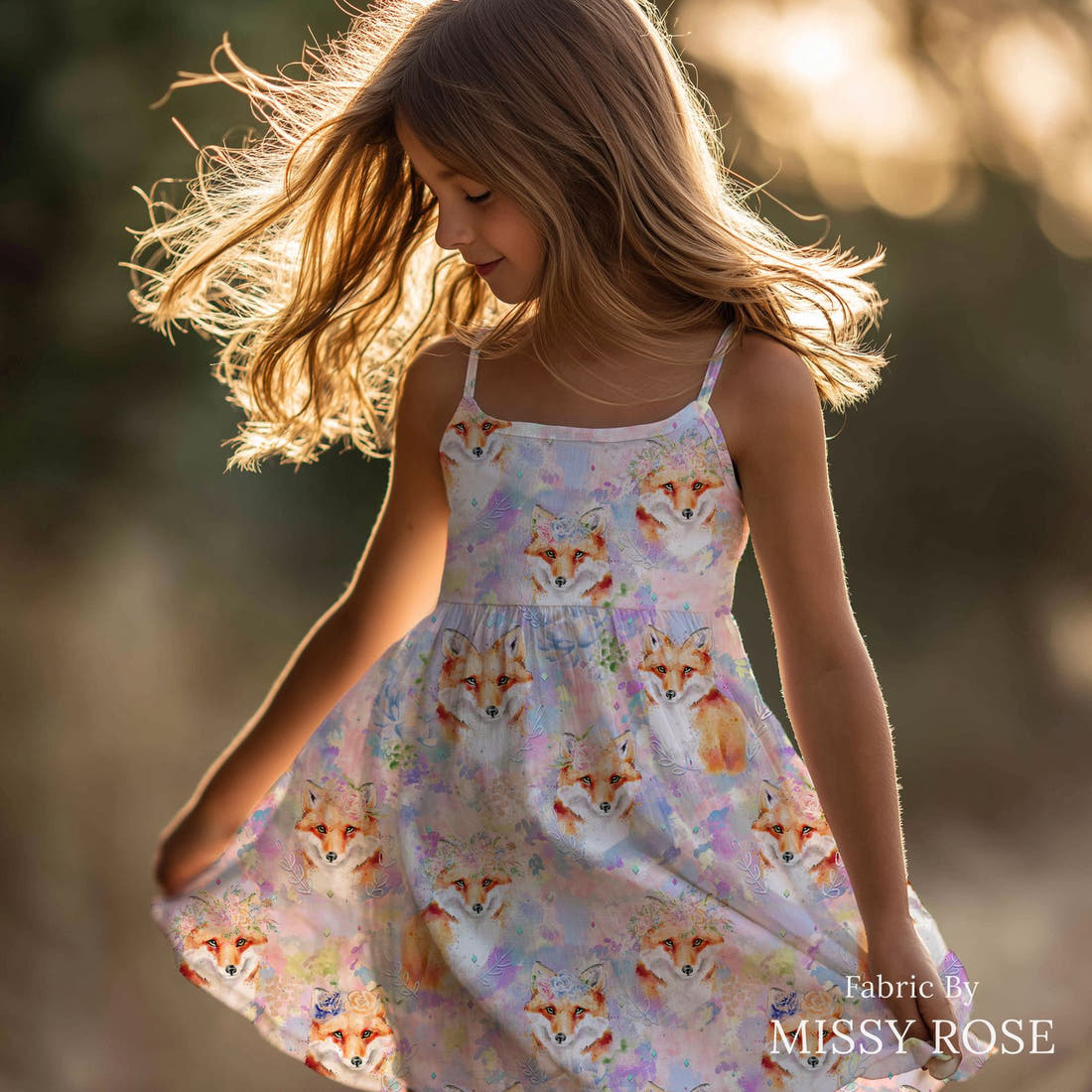 Design 681 Purple Fox Fabric sewn into a girls' dress – see how the print looks made up | Fabric by Missy Rose