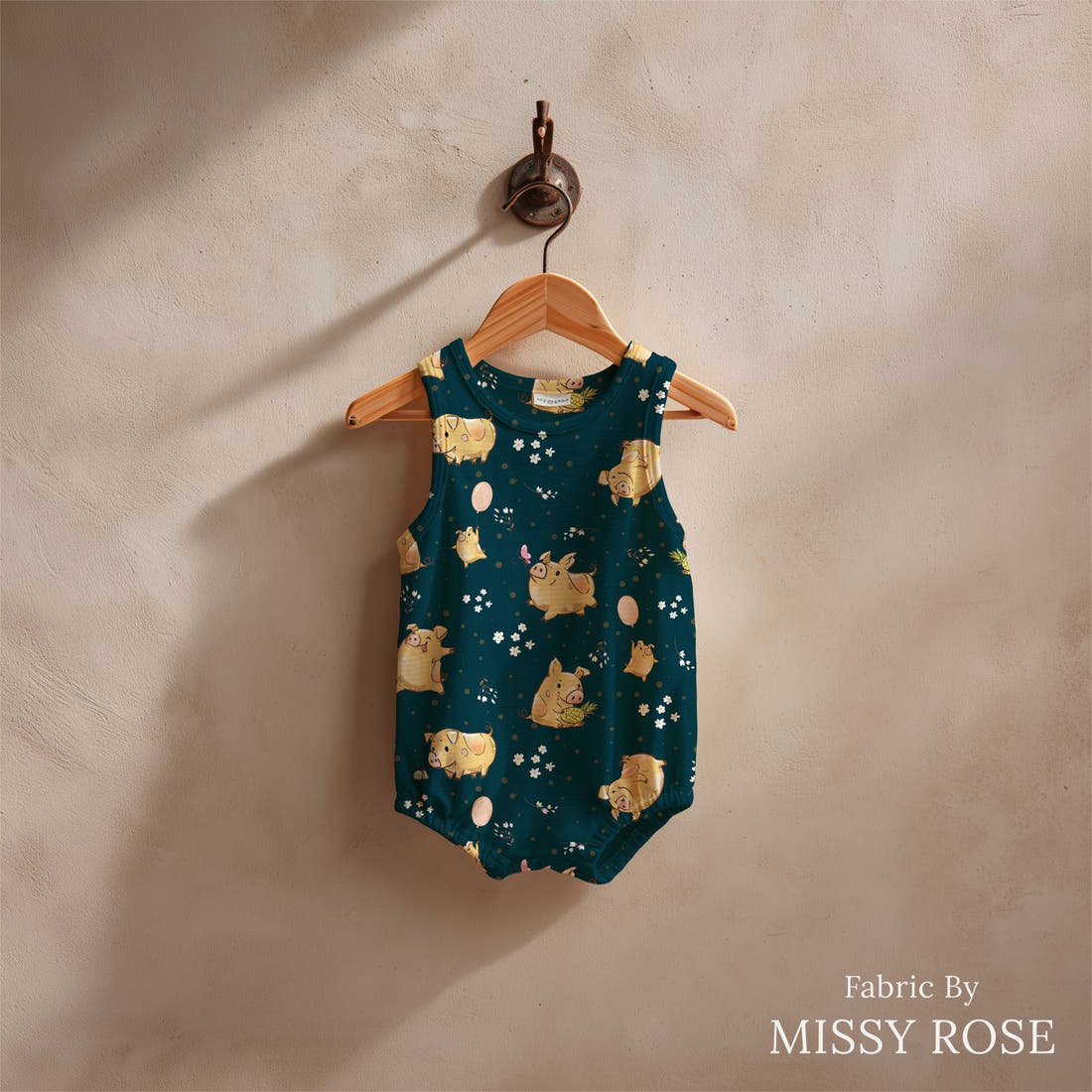 Design 70 Navy Pigs Fabric sewn into a baby romper – see how the print looks made up | Fabric by Missy Rose