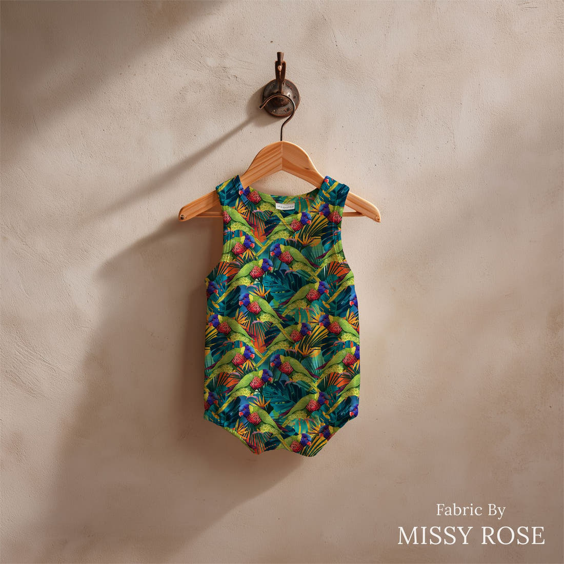 Design 78 Lorikeet Fabric sewn into a baby romper – see how the print looks made up | Fabric by Missy Rose