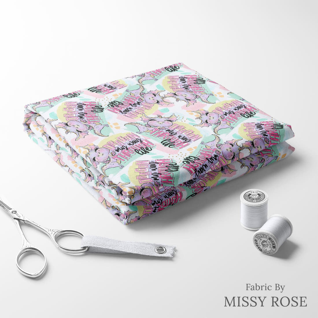 Design 800 Cheeky Dragon Fabric folded fabric stack with matching thread – pre-order fabric Australia | Fabric by Missy Rose