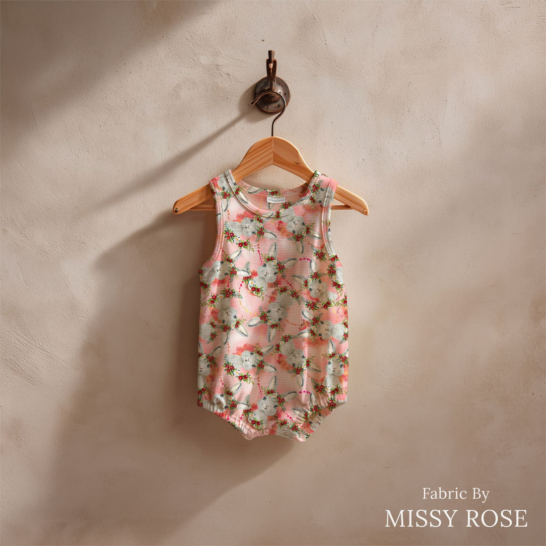 Design 809 Red Bunny Fabric sewn into a baby romper – see how the print looks made up | Fabric by Missy Rose