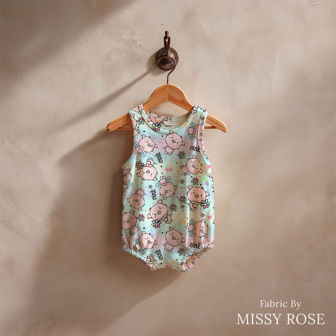 Design 831 Pigs Fabric sewn into a baby romper – see how the print looks made up | Fabric by Missy Rose