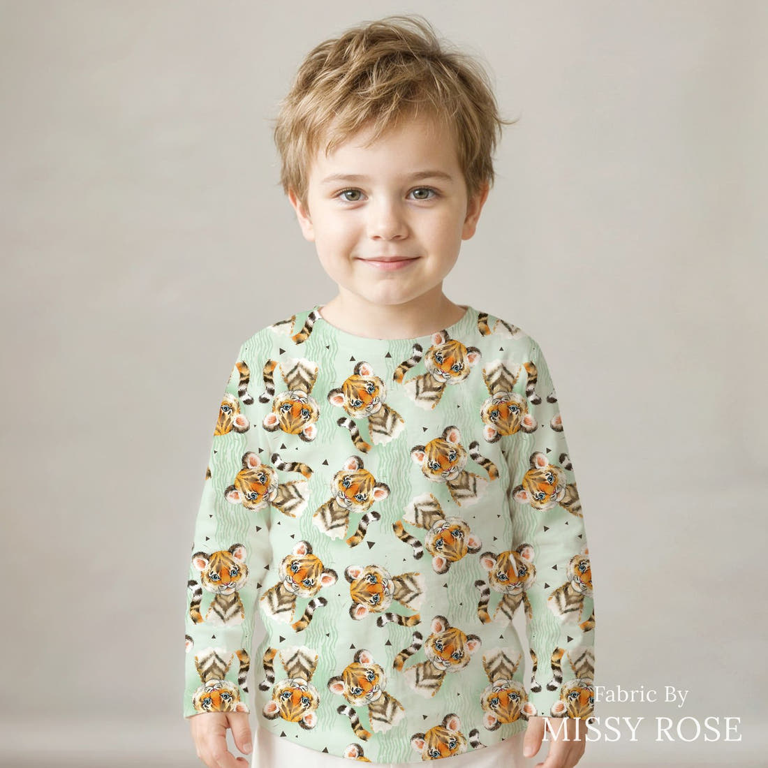 Design 839 Green Tiger Fabric sewn into a kids' long sleeve top – see how the print looks made up | Fabric by Missy Rose