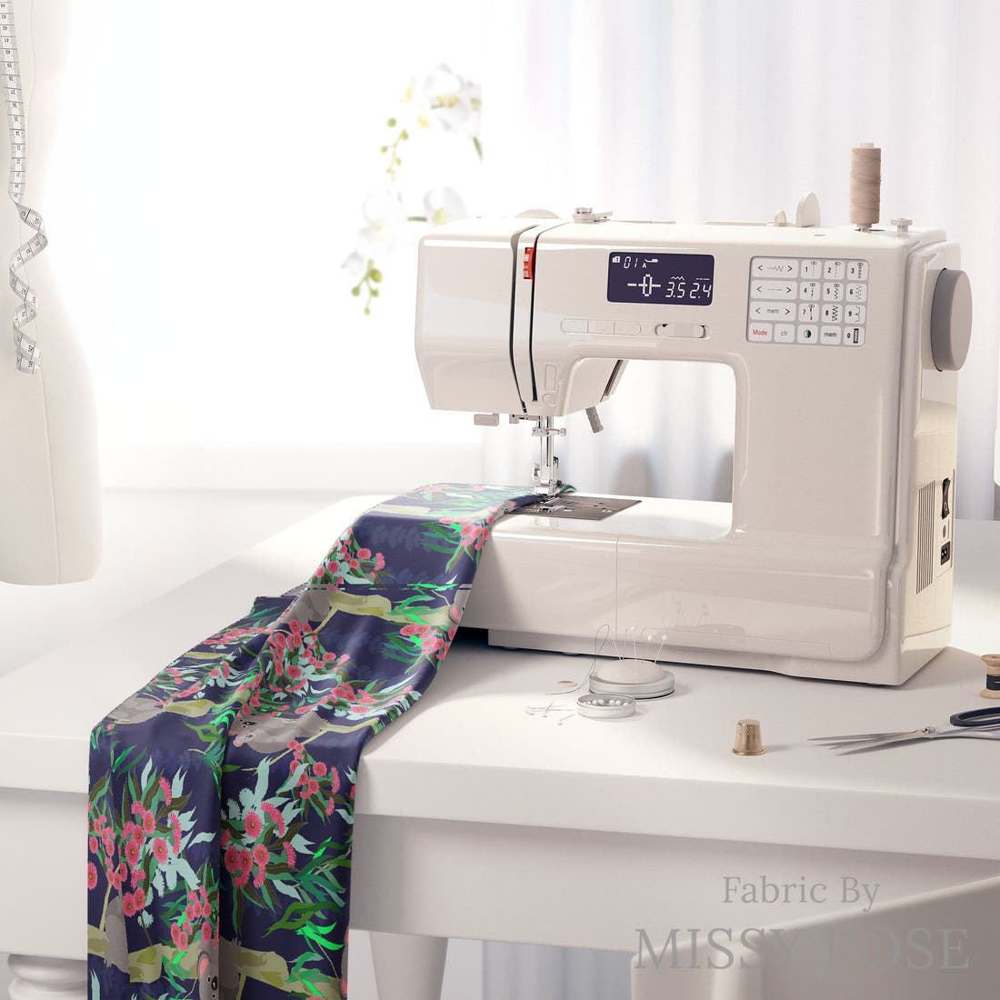 Design 845 Navy Koala Fabric on a sewing machine – premium fabric for sewing projects | Fabric by Missy Rose