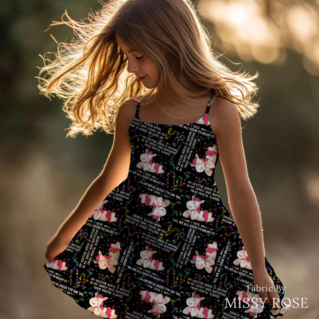 Design 868 Funny Unicorn Fabric sewn into a girls' dress – see how the print looks made up | Fabric by Missy Rose