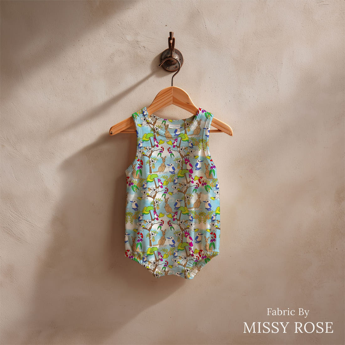 Design 873 Australian Animals Fabric sewn into a baby romper – see how the print looks made up | Fabric by Missy Rose