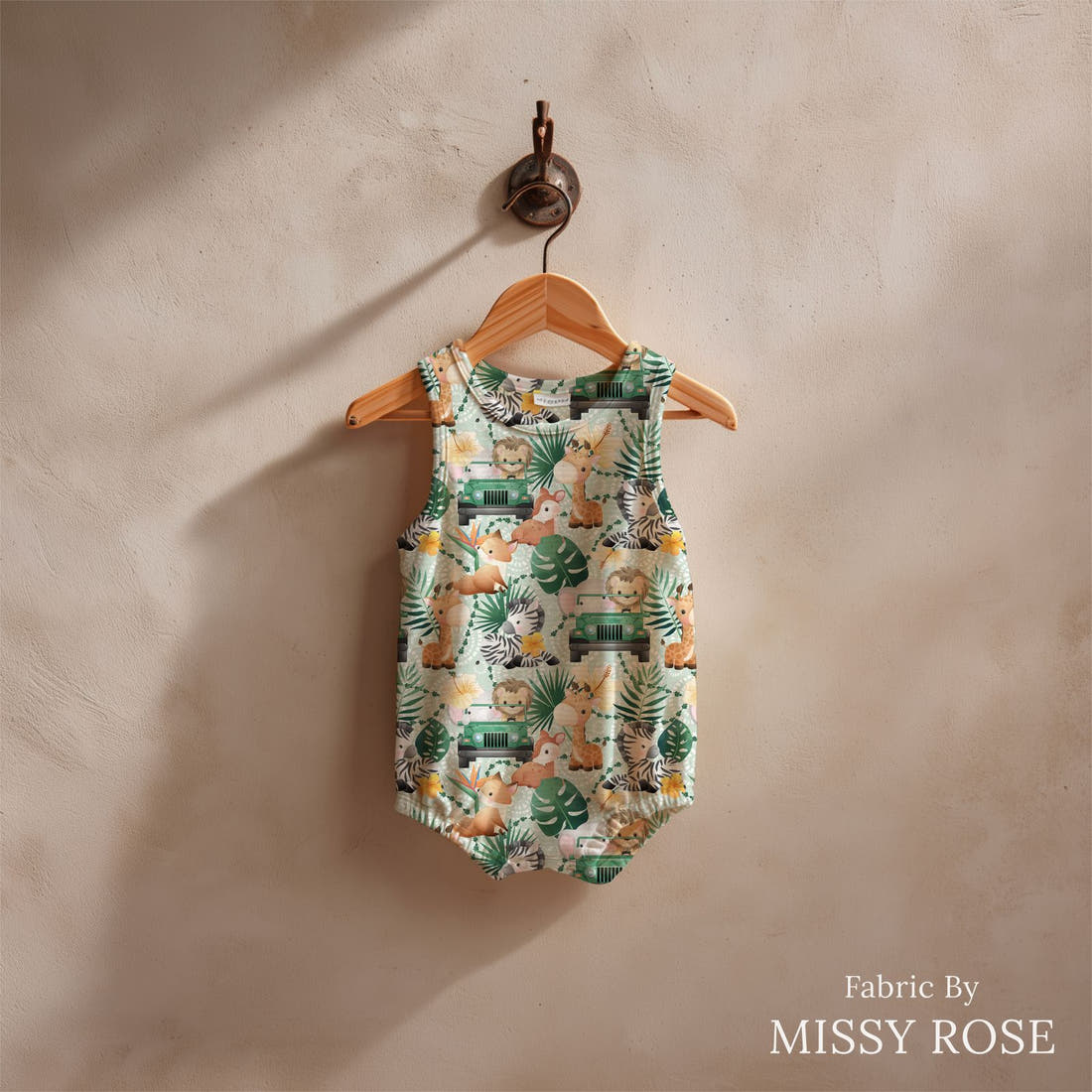 Design 875 Safari Animals Fabric sewn into a baby romper – see how the print looks made up | Fabric by Missy Rose