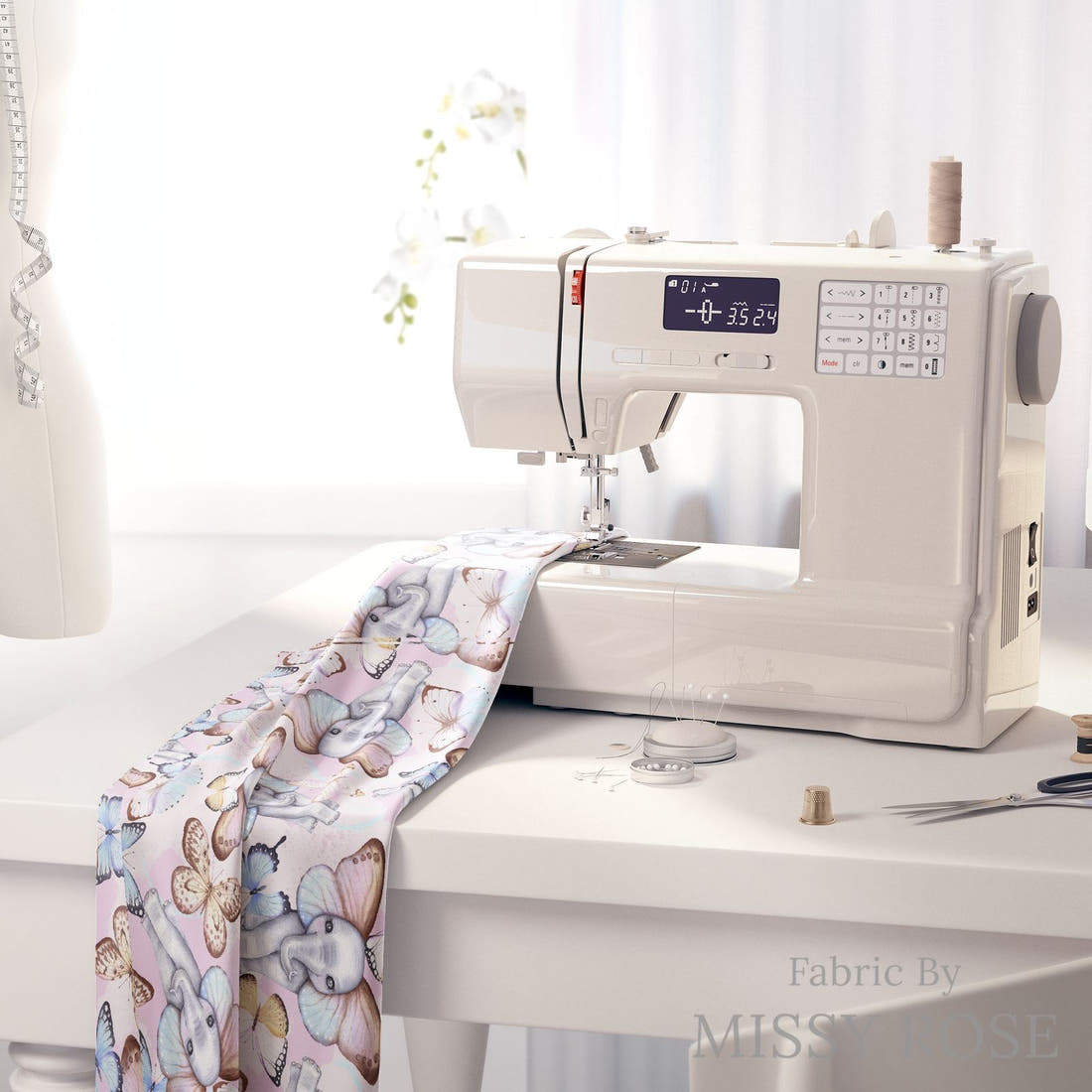 Design 886 Butterfly Elephant Fabric on a sewing machine – premium fabric for sewing projects | Fabric by Missy Rose