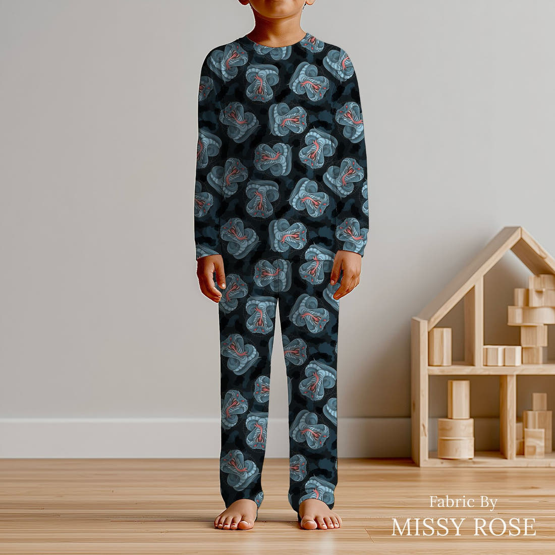 Design 897 Cobra Fabric sewn into kids' pyjamas – see how the print looks made up | Fabric by Missy Rose