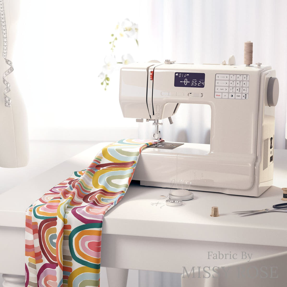 Design 9 Rainbow Fabric on a sewing machine – premium fabric for sewing projects | Fabric by Missy Rose