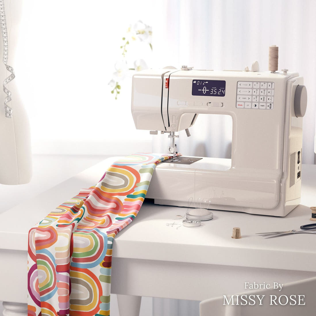 Design 9 Rainbow Fabric on a sewing machine – premium fabric for sewing projects | Fabric by Missy Rose