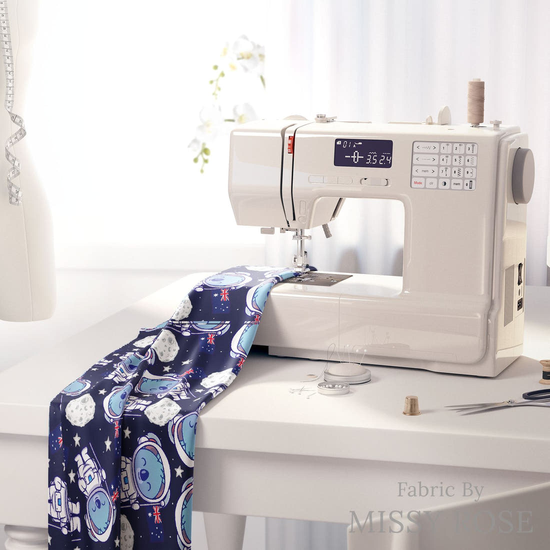 Design 903 Space Koala Fabric on a sewing machine – premium fabric for sewing projects | Fabric by Missy Rose