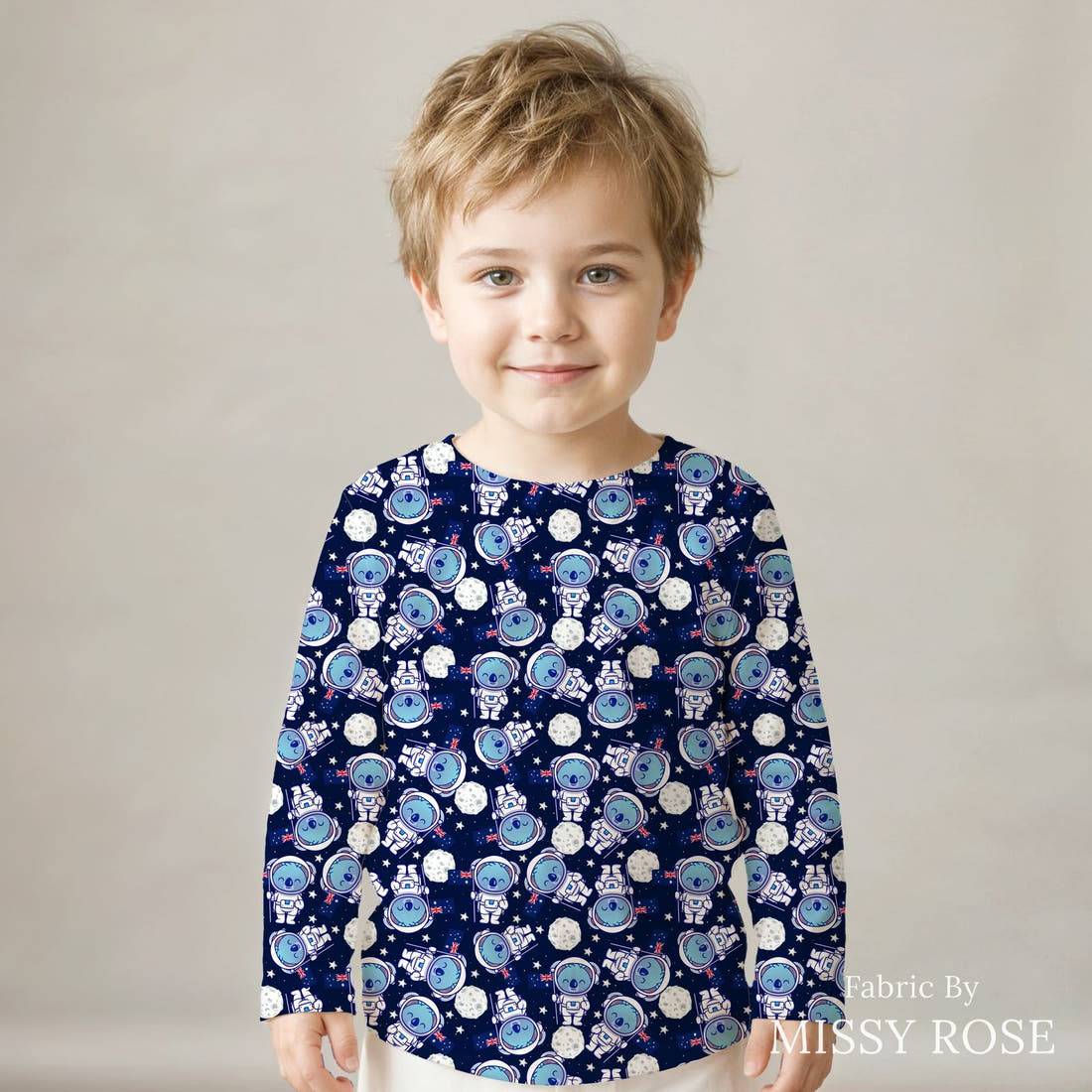 Design 903 Space Koala Fabric sewn into a kids' long sleeve top – see how the print looks made up | Fabric by Missy Rose