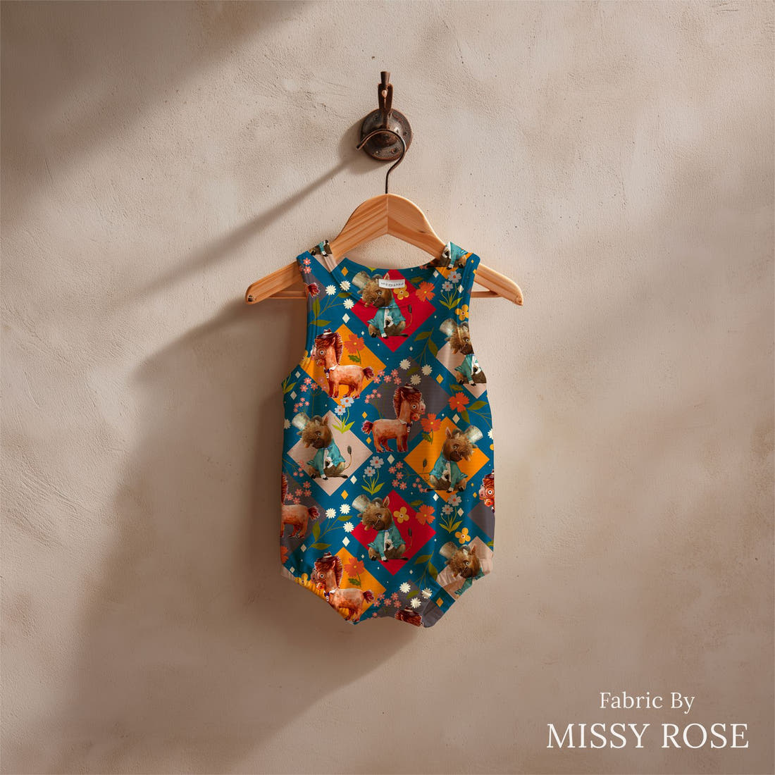 Design 904 Quirky Farm Animals Fabric sewn into a baby romper – see how the print looks made up | Fabric by Missy Rose