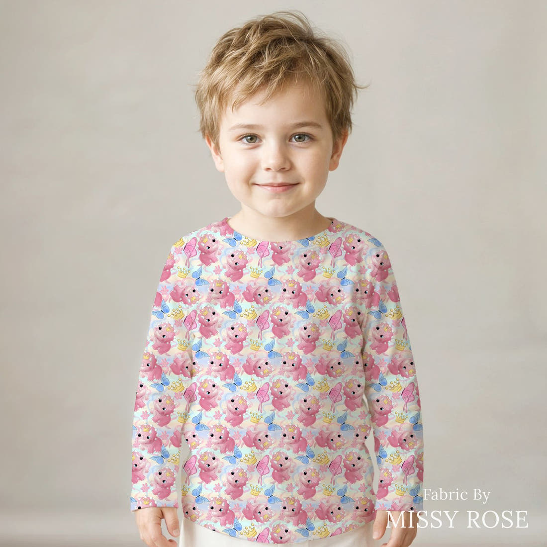 Design 905 Cute Dino Fabric sewn into a kids' long sleeve top – see how the print looks made up | Fabric by Missy Rose