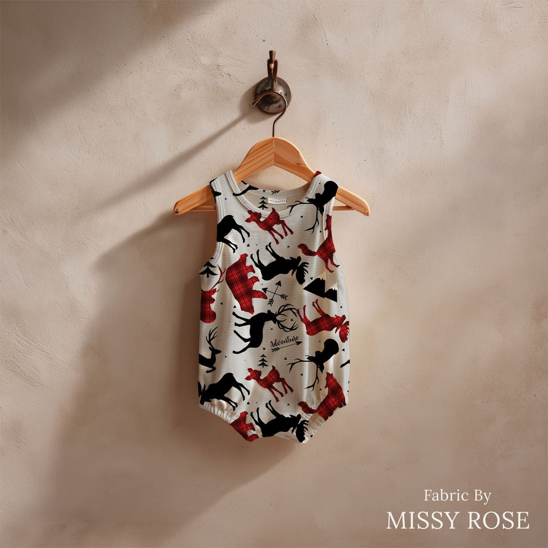 Design 925 Grey Woodlands Fabric sewn into a baby romper – see how the print looks made up | Fabric by Missy Rose