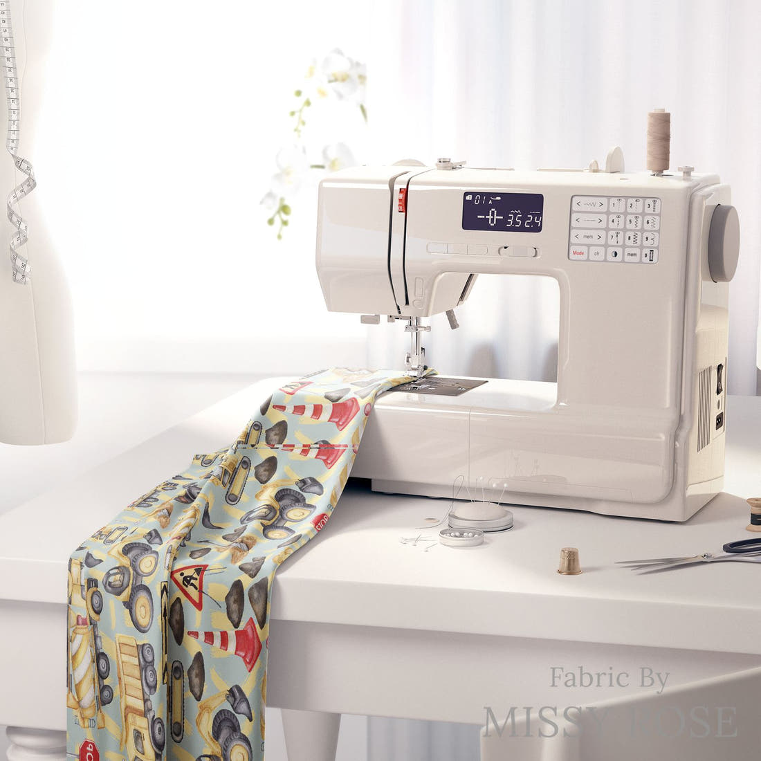 Design 942 Blue Construction Fabric on a sewing machine – premium fabric for sewing projects | Fabric by Missy Rose