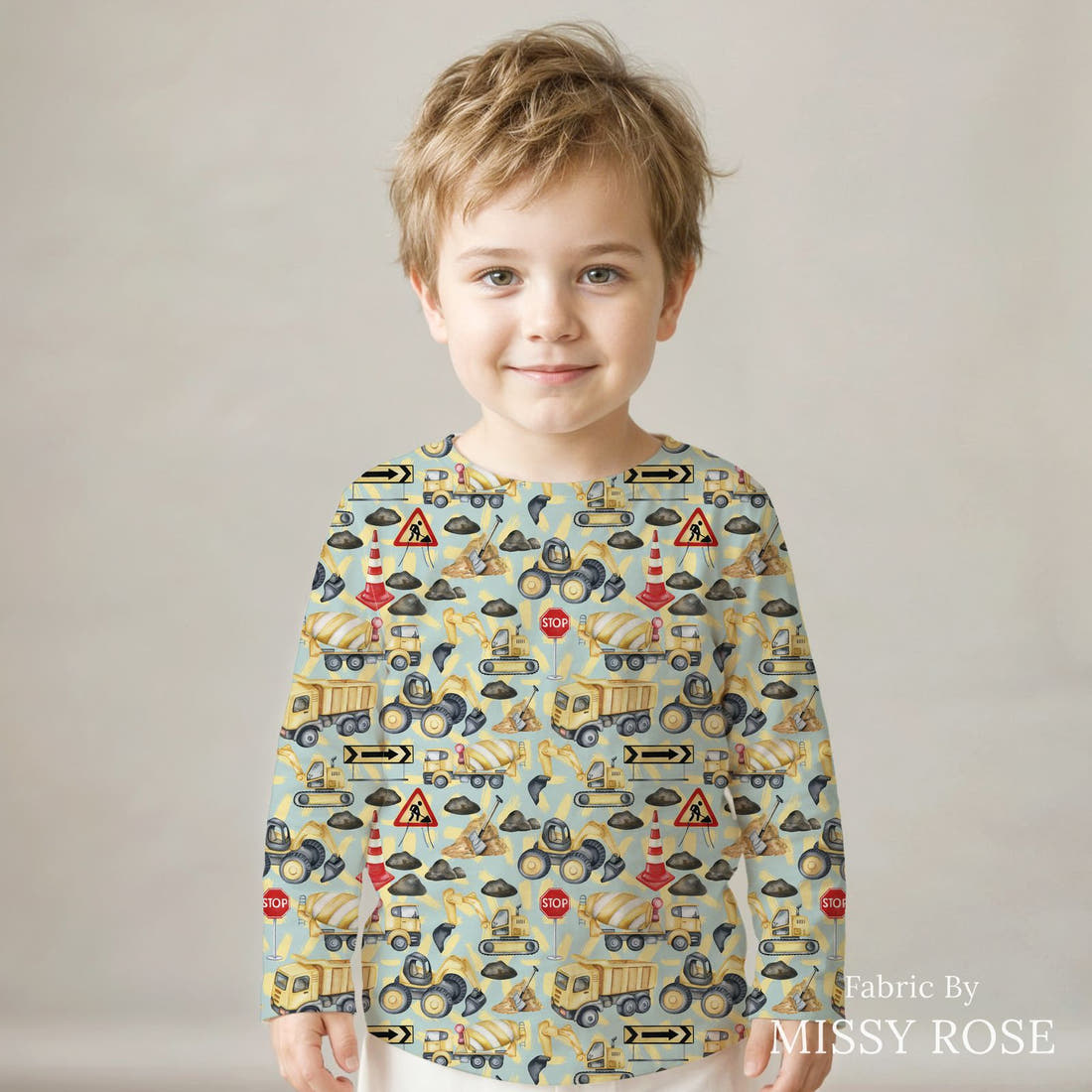 Design 942 Blue Construction Fabric sewn into a kids' long sleeve top – see how the print looks made up | Fabric by Missy Rose