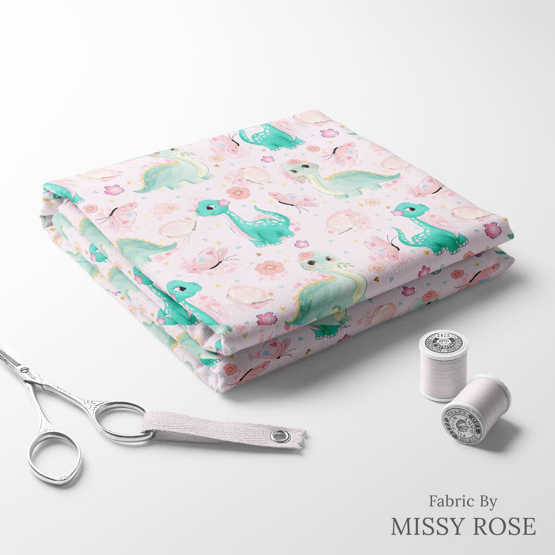 Design 943 Pink Dinosaur Fabric folded fabric stack with matching thread – pre-order fabric Australia | Fabric by Missy Rose