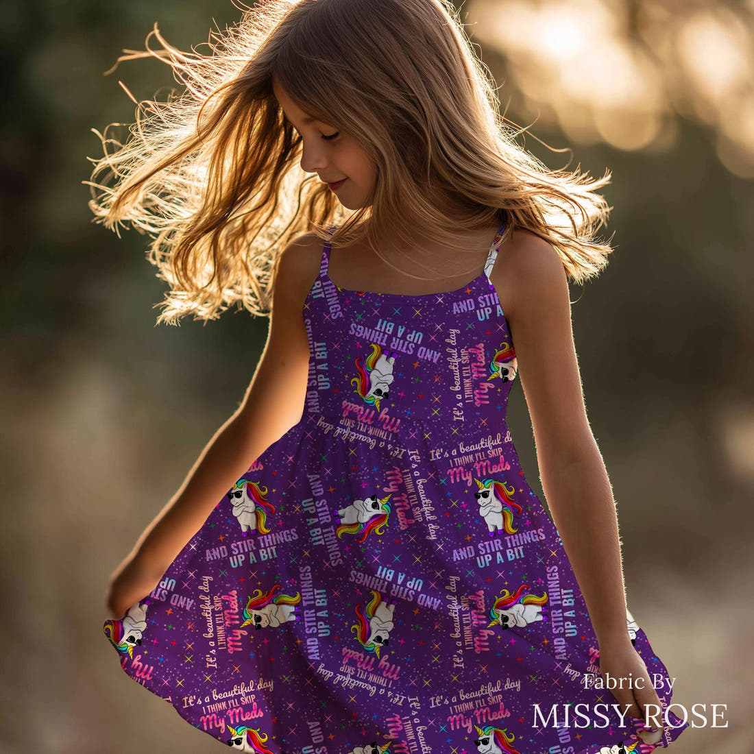 Design 958 Funny Unicorn Fabric sewn into a girls' dress – see how the print looks made up | Fabric by Missy Rose