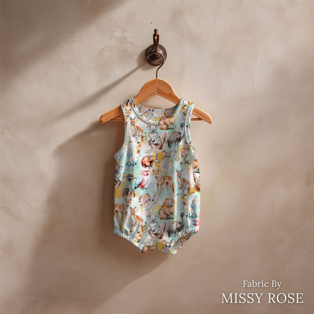 Design 96 Australian Animals Fabric sewn into a baby romper – see how the print looks made up | Fabric by Missy Rose