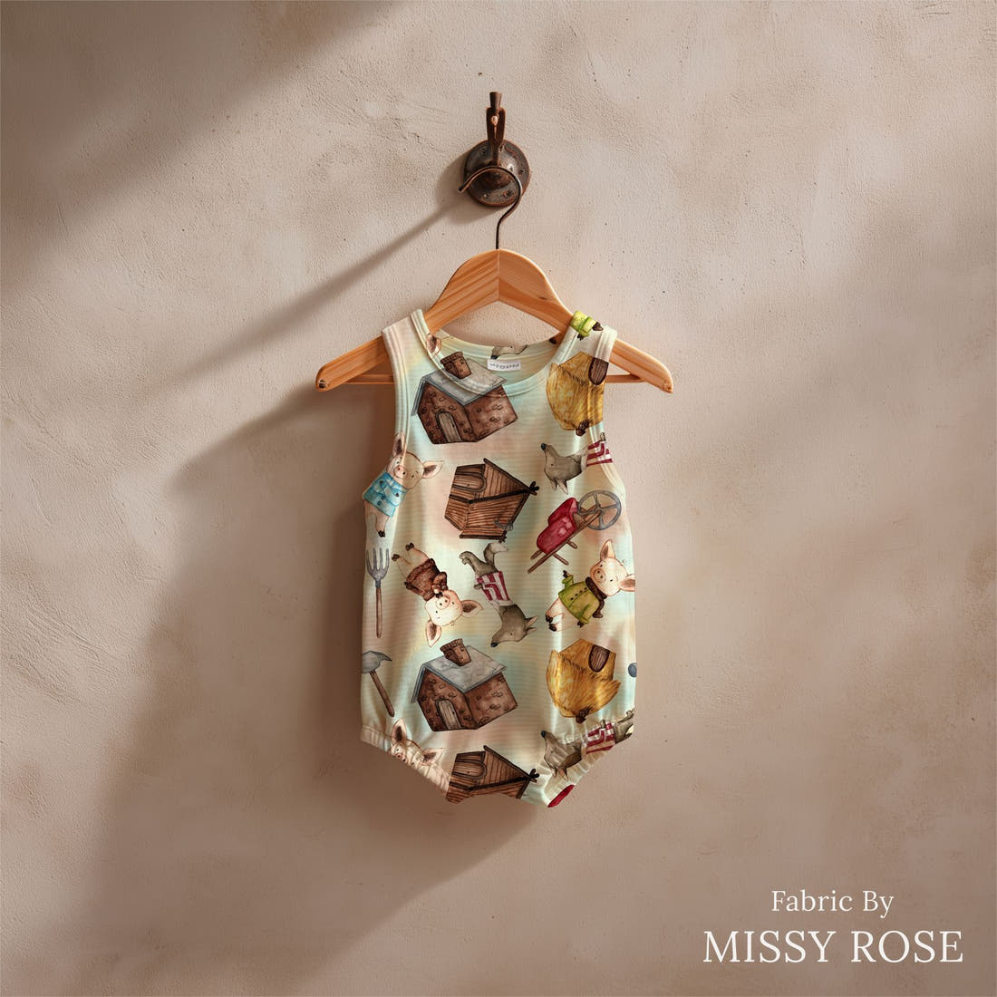 Design 968 Little Pigs Fabric sewn into a baby romper – see how the print looks made up | Fabric by Missy Rose