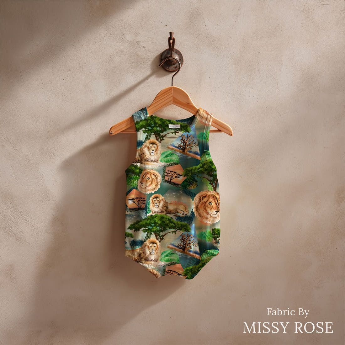 Design 976 Lion Fabric sewn into a baby romper – see how the print looks made up | Fabric by Missy Rose