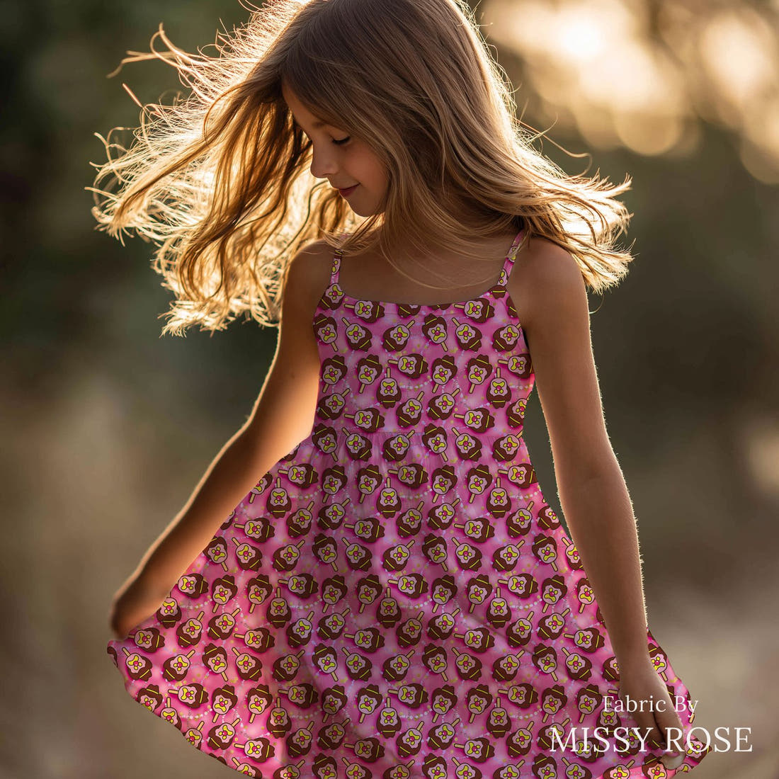 Design 987 Hot Pink Ice Cream Fabric sewn into a girls' dress – see how the print looks made up | Fabric by Missy Rose