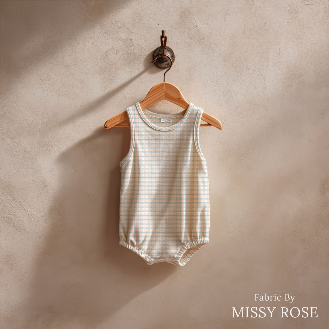 Indy Bloom Fabric Easter Party Plaid 09 sewn into a baby romper - custom printed fabric | Fabric by Missy Rose