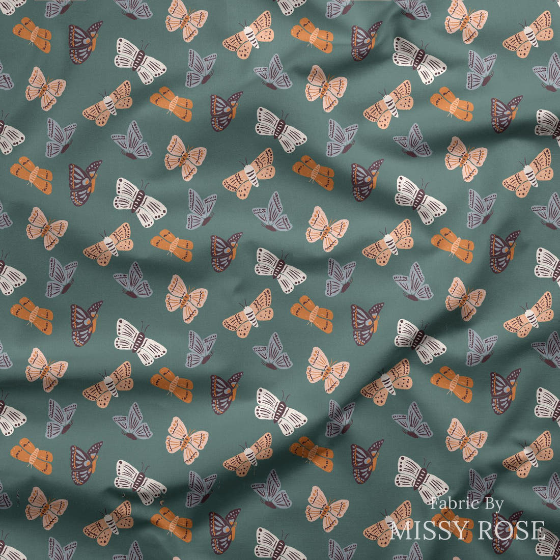 Indy Bloom Fabric Ember Fall Moths In Green 04 draped fabric mockup - custom printed fabric by the metre | Fabric by Missy Rose