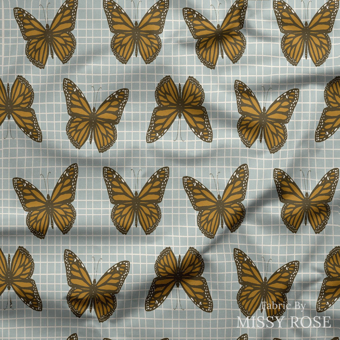 Indy Bloom Fabric Golden Girl Catching Butterflies 06 draped fabric mockup - custom printed fabric by the metre | Fabric by Missy Rose