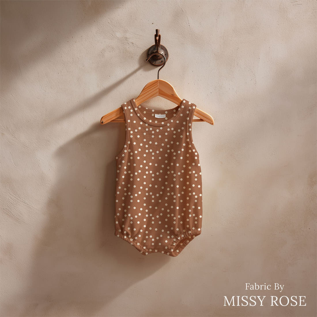 Indy Bloom Fabric Grandmas Garden Rust Polka 20 sewn into a baby romper - custom printed fabric | Fabric by Missy Rose