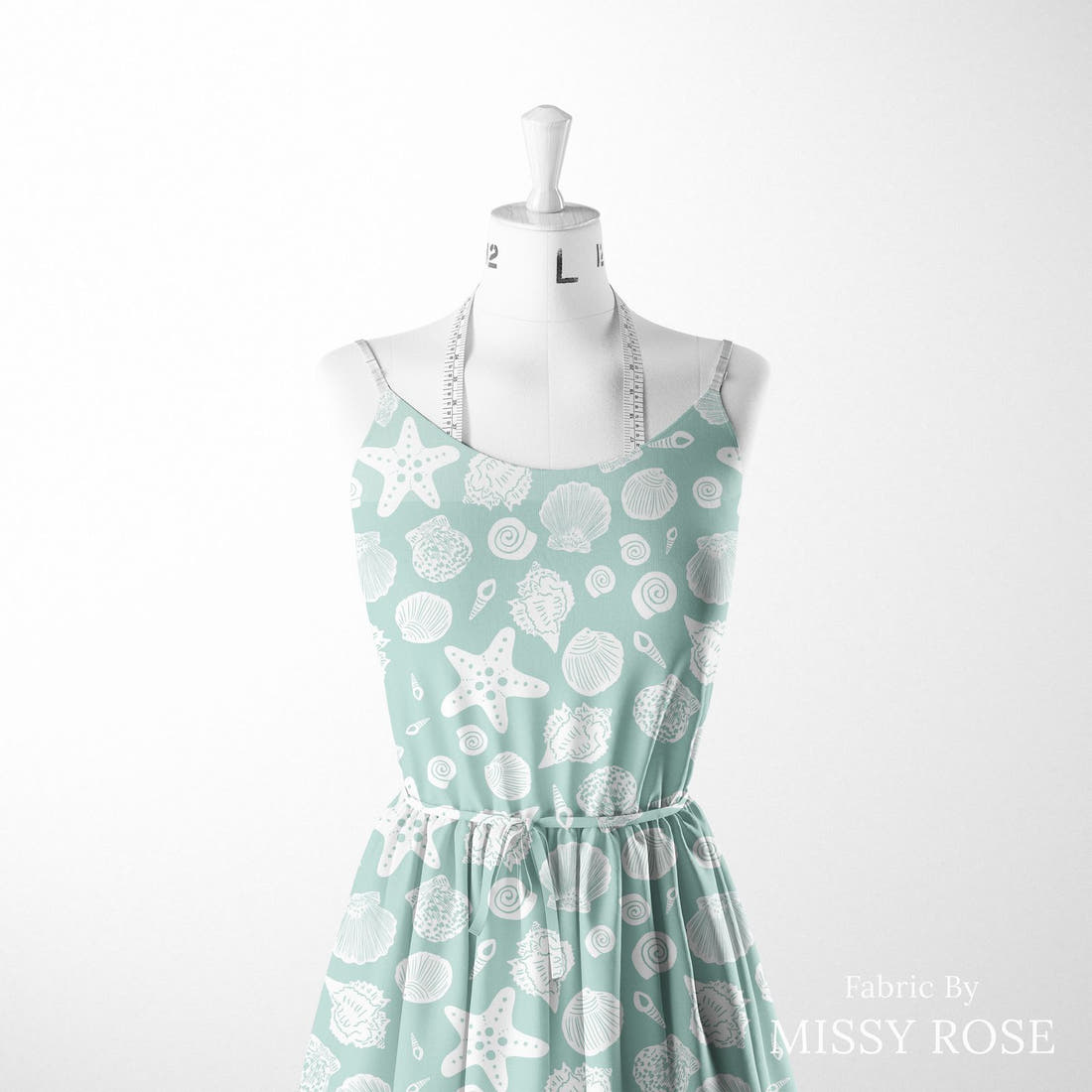 Indy Bloom Fabric Laguna Summer Sea Shells In Green 11 sewn into a women's dress - custom printed fabric | Fabric by Missy Rose